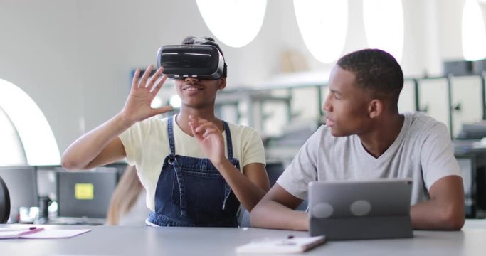 High school students using VR headset in class
