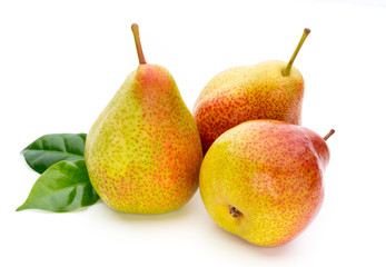 Fresh bio pear with leaves on isolated white background.