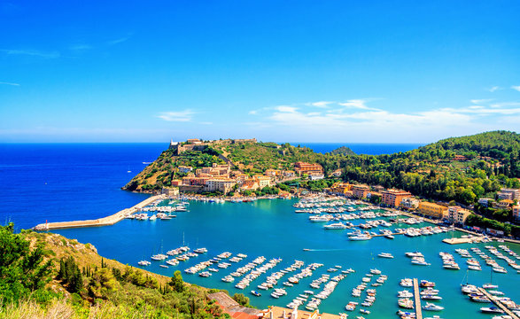Fototapeta Panoramic aerial view of Porto Ercole town, Monte Argentario, Grosseto, Tuscany, Italy. Architecture and landmark of Porto Ercole and Italy. Tuscany is a region in central Italy