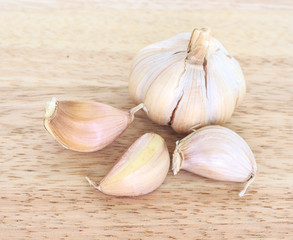 garlic vegetable ingredient food top view on wooden background