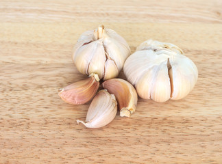 garlic vegetable ingredient food top view on wooden background