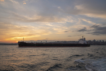 Fototapeta premium international oil tanker ship in sunset