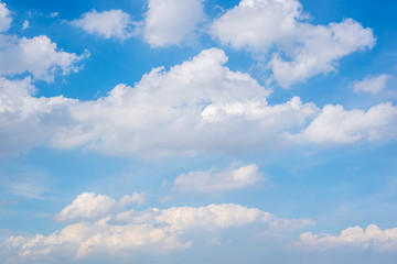 Naklejka na ściany i meble Cloudscape with blue sky and white clouds