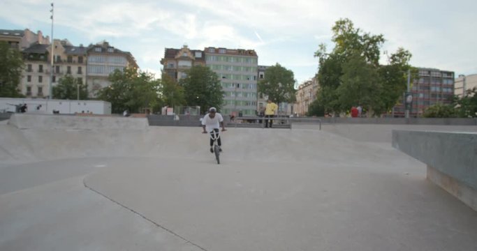 BMX rider in skatepark slowmotion 4K