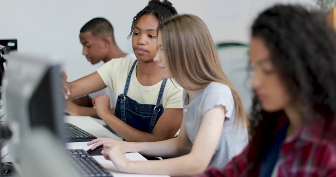 Students working together in a computer science class