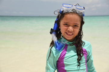 Young girl enjoys the beach in Boracay, Philippines
