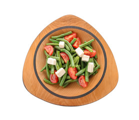 Plate with tasty green beans, tomatoes and cheese on white background