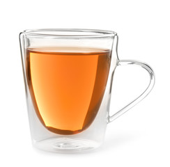 Glass cup of black tea on white background