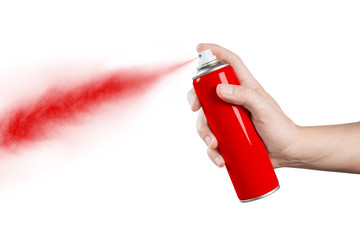Hand using red spray, isolated on black background