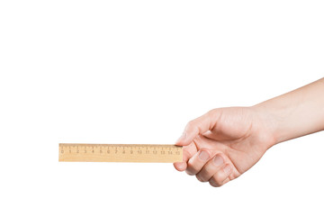 Hand holding wooden ruler, isolated on white background