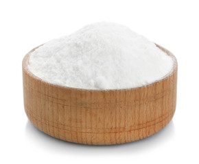 Bowl with baking soda on white background
