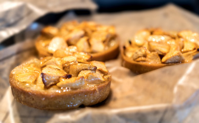 sweet pastry individual apple pie exposed in a store, bakery cake for an appetizing breakfast