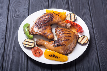 Grilled chicken legs with vegetables