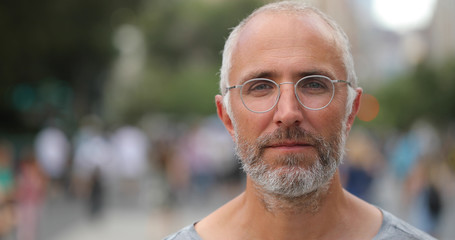 Mature caucasian man in city face portrait