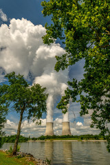 Pair of nuclear reactors at the Watts Bar site in Tennessee with reflection in a lake