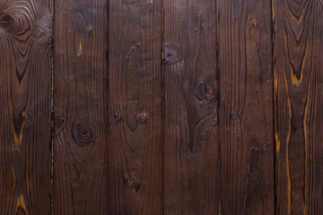 Naklejka premium Texture of dark brown wooden planks