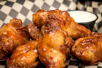 Café lunch basket filled with golden Chicken Wings