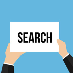 Man showing paper SEARCH text