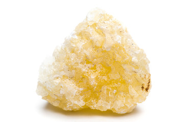 Yellow calcite mineral isolated on white background