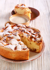 Apple cake with icing sugar on top