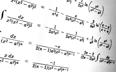 Large number of mathematical formulas on a white background