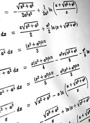 Large number of mathematical formulas on a white background