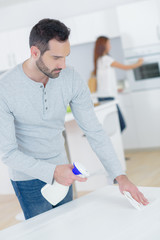 Man cleaning the kitchen