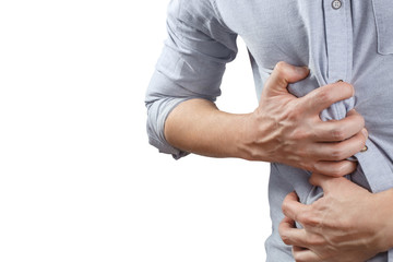 Fototapeta premium Man feeling terrible stomach ache, isolated on w