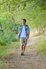 man walking in the forest