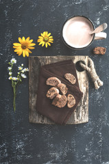 Cup of coffee with milk  and chocolate cookies on the white background. Rustic style