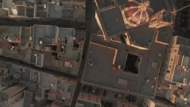 Aerial Shot - Top shot over flat roofed buildings