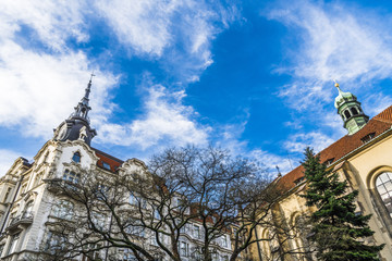 Blue sky over the roofs of Prague's houses