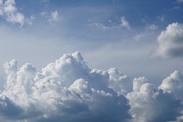 Naklejka na ściany i meble Amazing cumulus clouds with sunlight on the background of clear blue sky, Summer in GA USA.