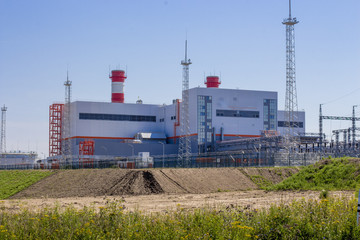 Fototapeta na wymiar thermal power plant on the background of the blue sky