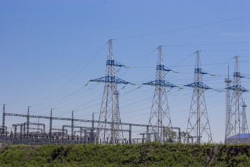 pillars of the power plant against the blue sky