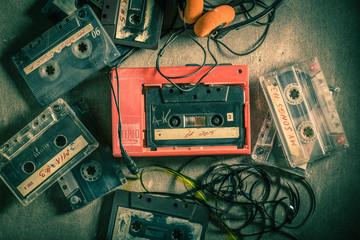 Classic audio cassette with walkman and headphones - obrazy, fototapety, plakaty