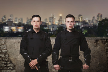 Cops in uniform on guard of law, concept