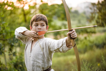 Young boy with a bow