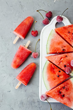 watermelon ice cream on a white ceramic board and gray background, summer dessert