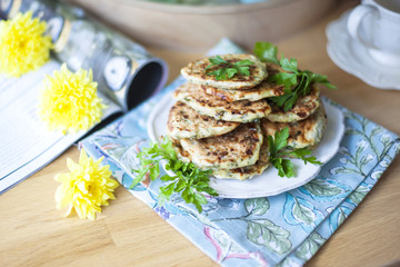 pancakes for breakfast. view from the window. vase with yellow flowers,