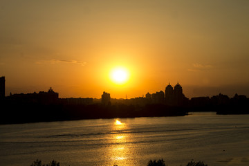 Sunset in city. In a few minutes night will come.