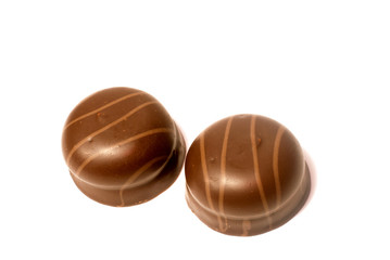 chocolate candy isolated on white background. delicious truffle. Delicious chocolate pralines...