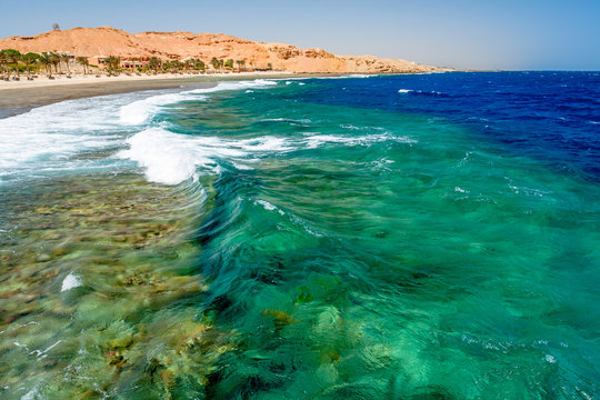 View of Wild Blue Green Waves at the Pier at Calimera Habiba Beach Resort