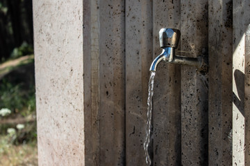 a water noir while water tap was flowing water