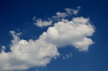 Naklejka na ściany i meble Clouds in the blue sky - Background