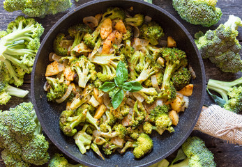 fresh broccoli and orange tomatoes, cooked broccoli with mushrooms, carrots and potatoes. organic...