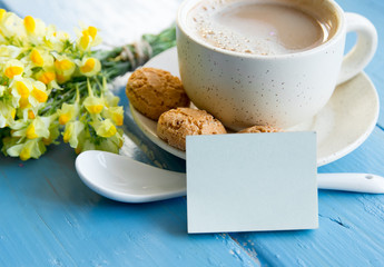 cup of coffee and bouquet of flowers decoration. sunny morning breakfast, place for lovely message 