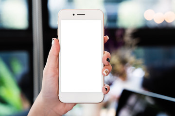 Woman hand holding mockup smartphone isolated white screen for app design or display