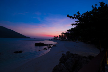 Fototapeta na wymiar Beautiful of sunrise with colorful sky in summer time concept travel, holiday and vacation. Tropical paradise beach nature landscape at Lipe island in Thailand.