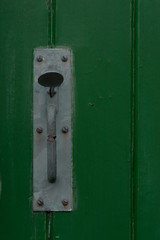 lock on green door